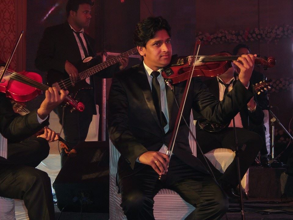 male violin players suez egypt